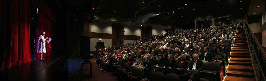 Sr. Carolyn welcomed a full house to the opening of the Arts Center earlier this year